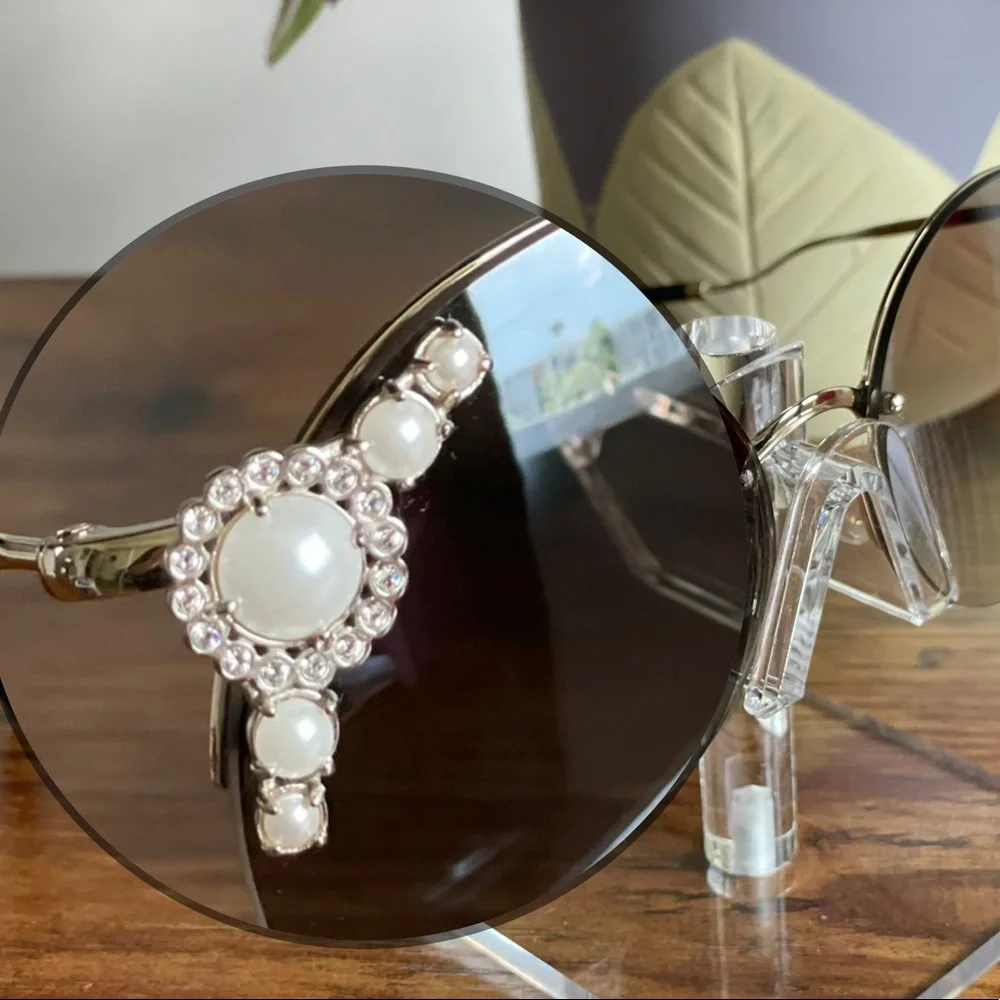 Miu Miu Sunglasses, Round Frameless - Picture 5 of 6
